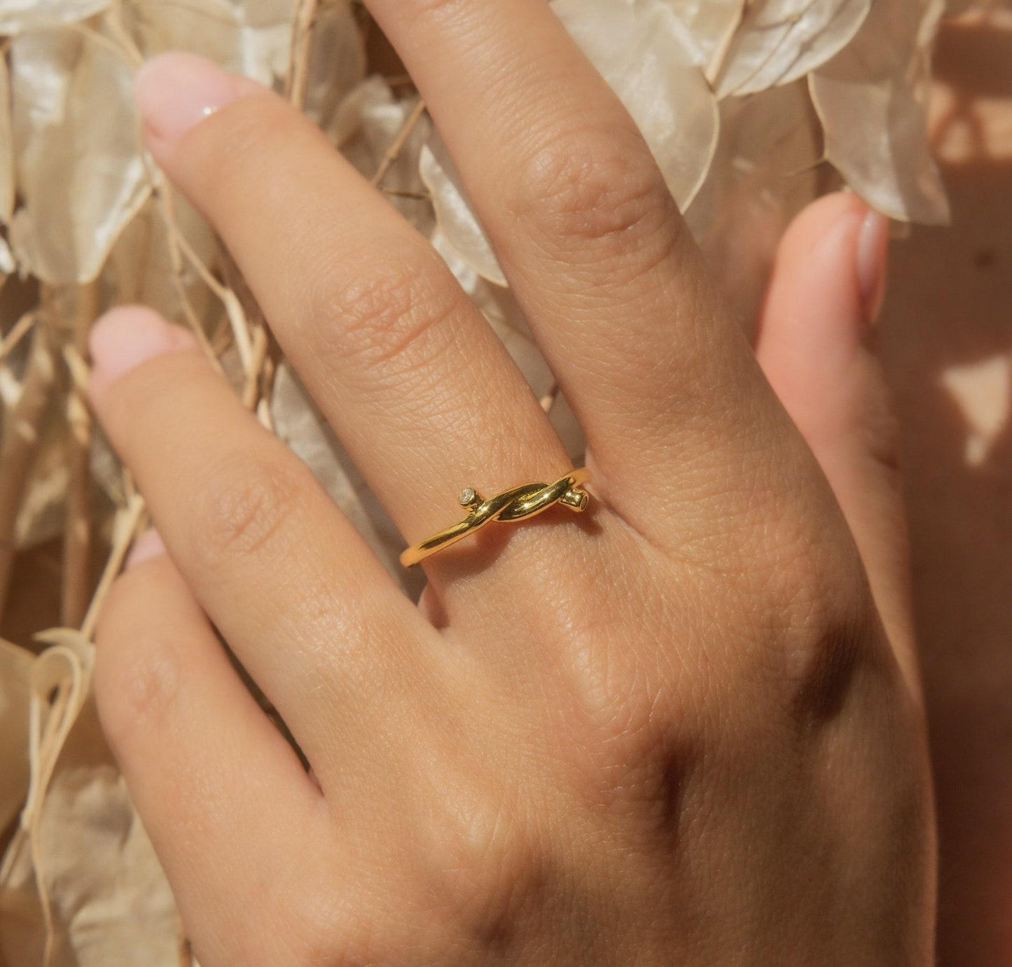 Gold Love Knot Ring with Diamonds