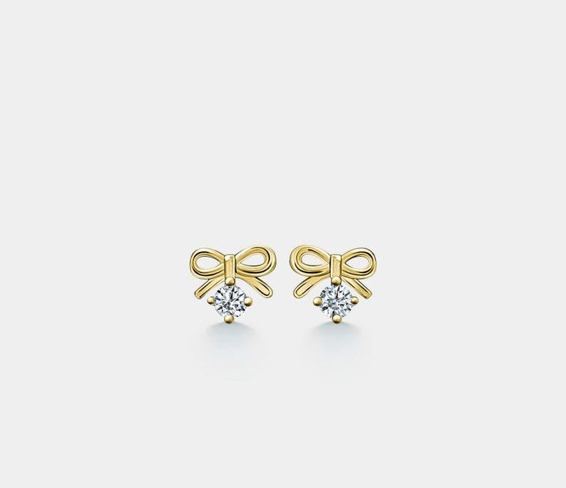 Gold Bow Tie Stud Earrings in Sterling Silver