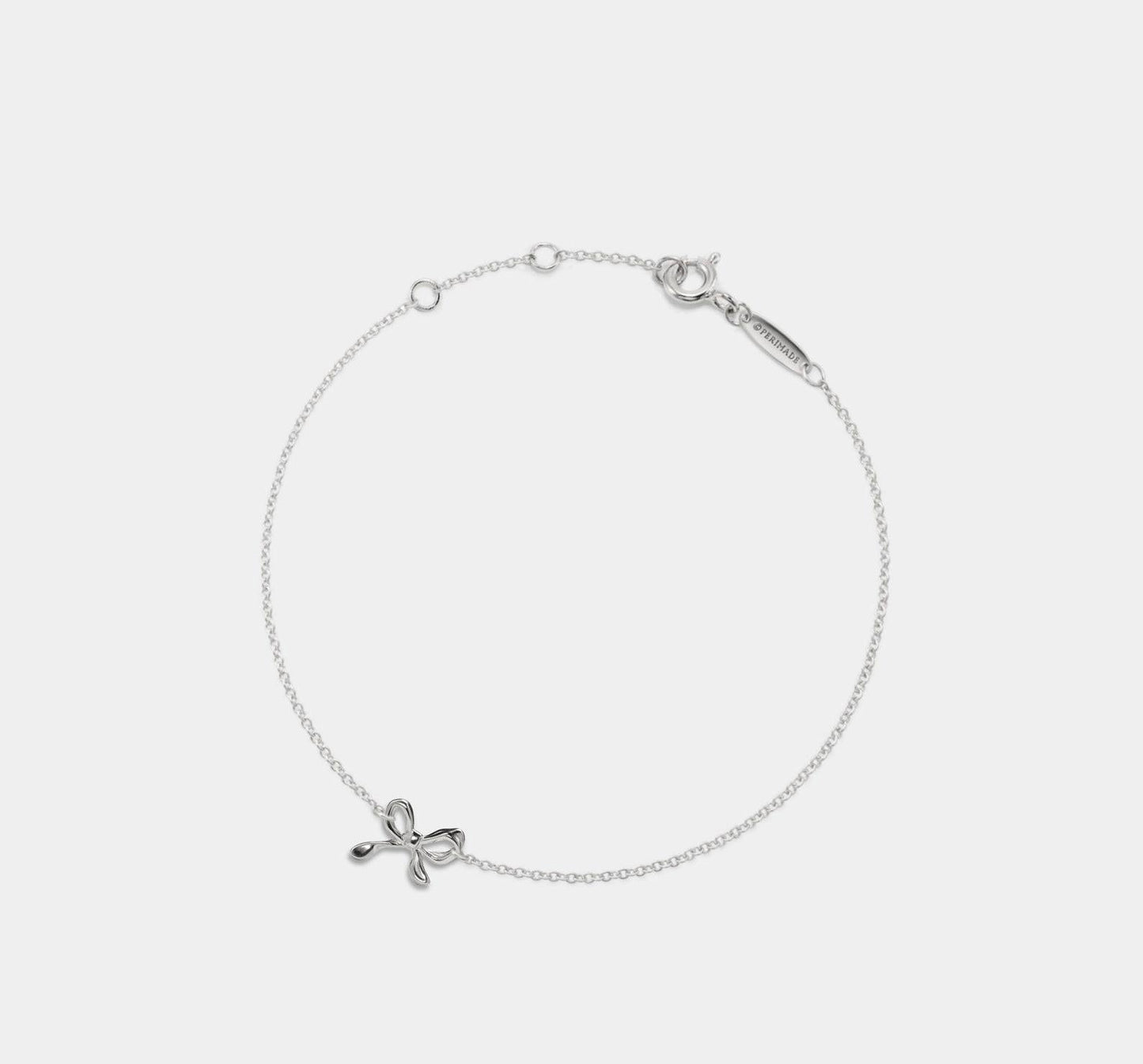 Dainty Bow Tie Charm Bracelet in Sterling Silver