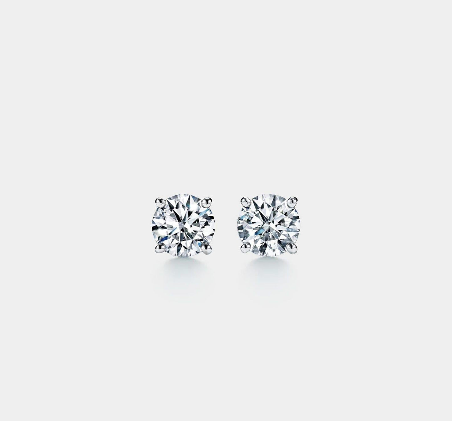 Dainty Moissanite Stud Earrings in Sterling Silver