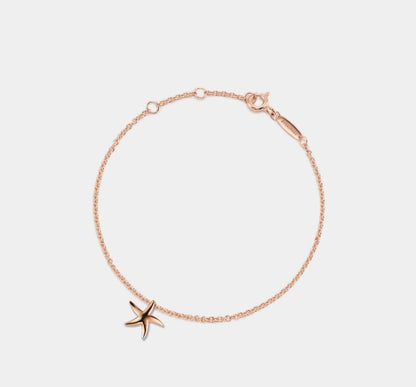 Dainty Starfish Charm Bracelet in Sterling Silver