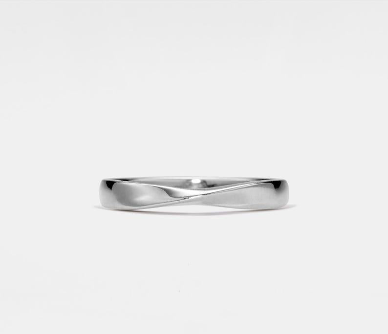 Moissanite Infinity Ring in Sterling Silver